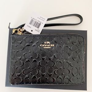 COACH Wristlet in Signature Patent leather